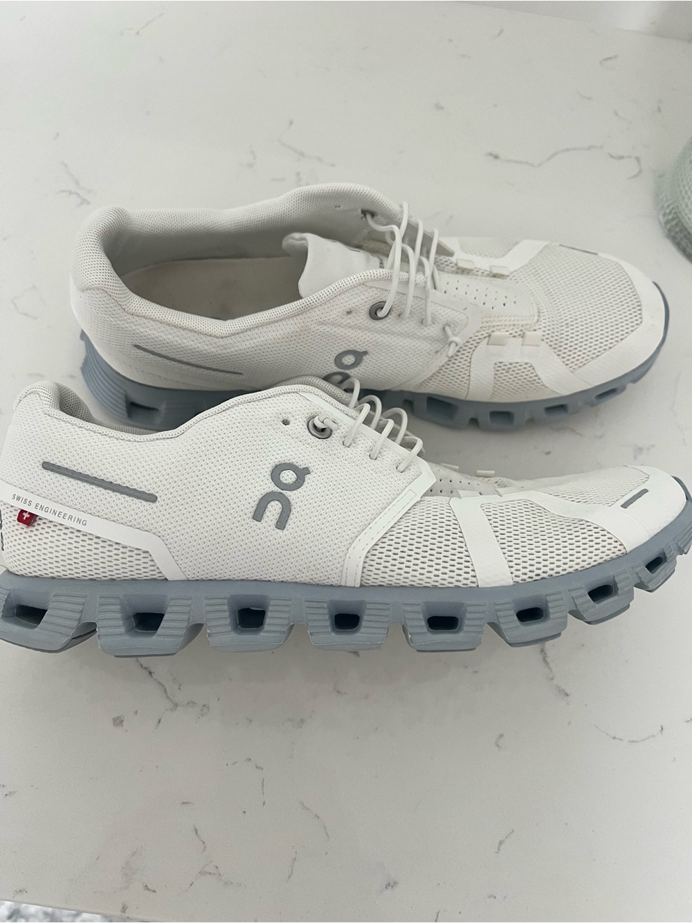 On Cloud Sneakers in White with Light blue Soles